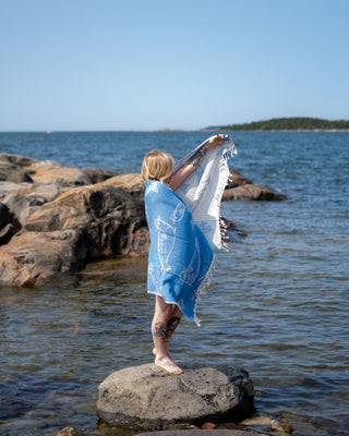 Saaren Taika suurikokoinen hamam pyyhe on imukykyinen, kevyt, pehmeä ja kuivuu nopeasti